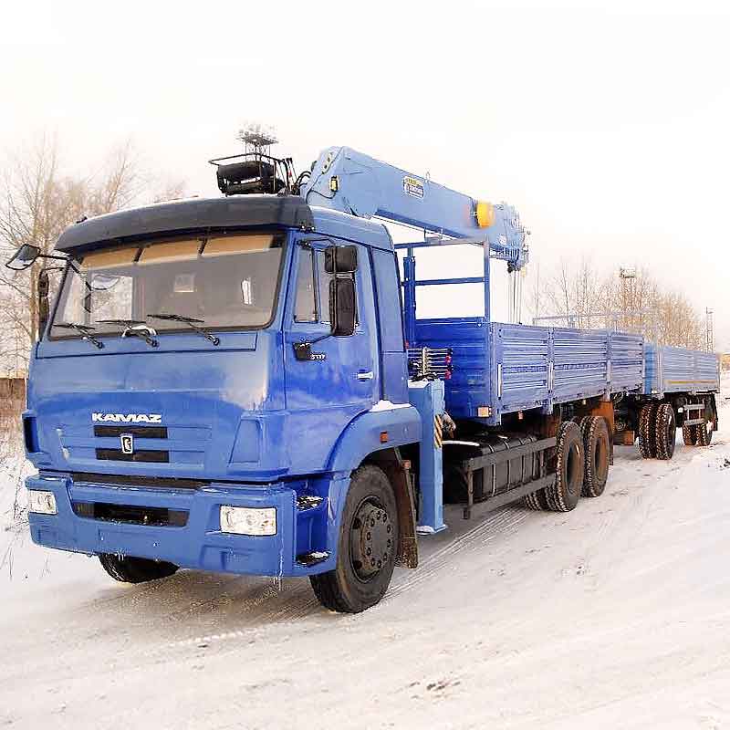 Перевозка грузов манипулятором с прицепом на шасси КАМАЗ